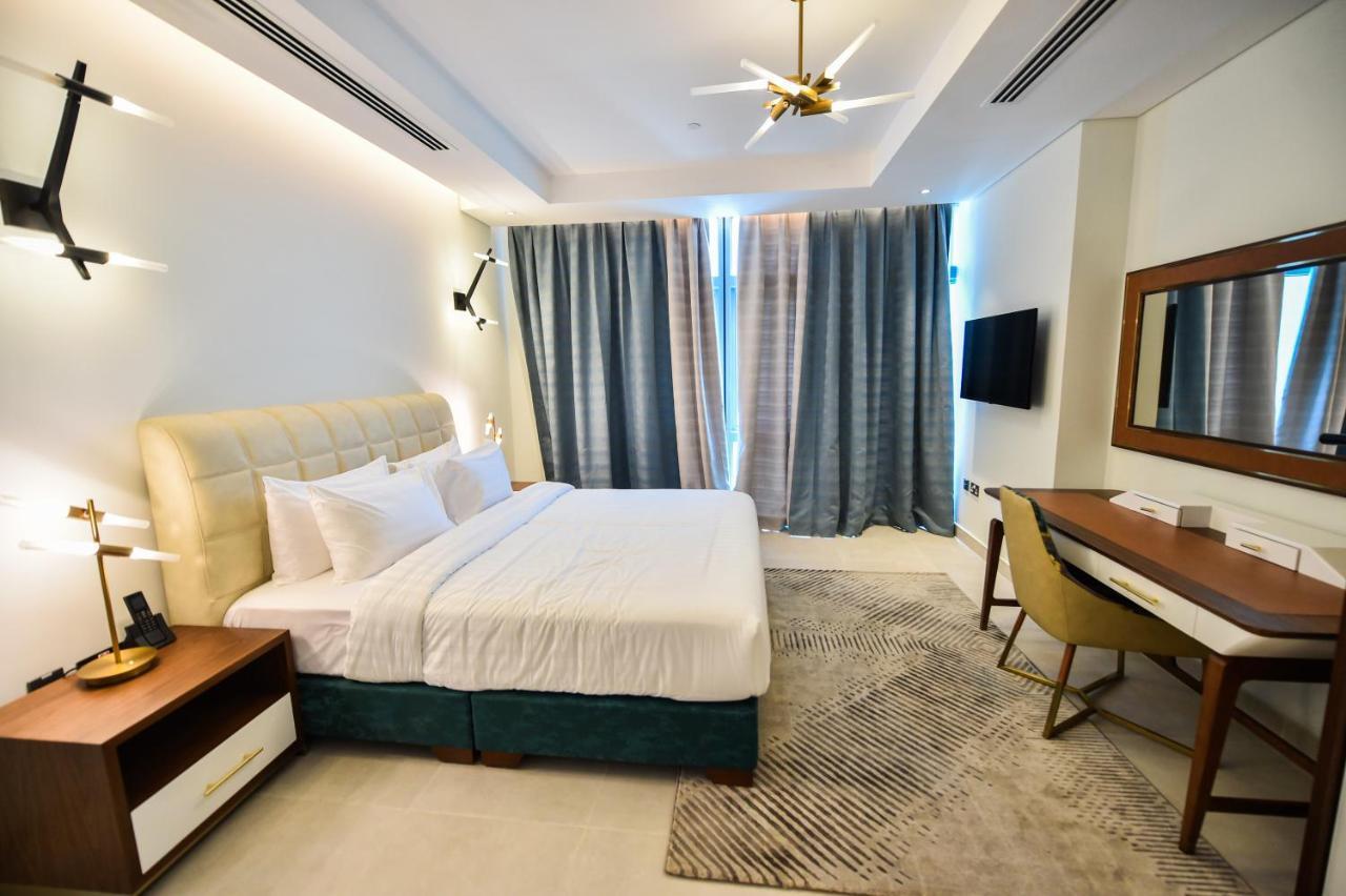 Waterfront Hotel Apartment Lusail Esterno foto A bedroom at the hotel