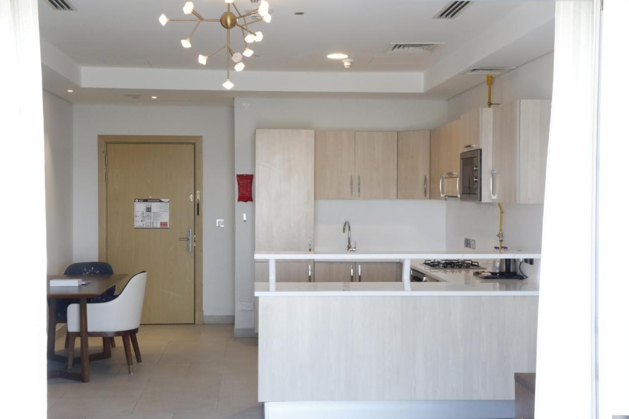 Waterfront Hotel Apartment Lusail Esterno foto A kitchen in a typical apartment